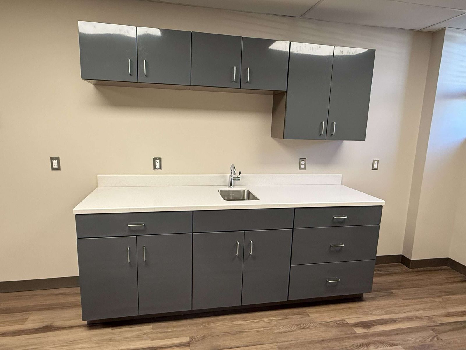 Powder coated steel cabinets installed in an office kitchen, by Custom Metal Home