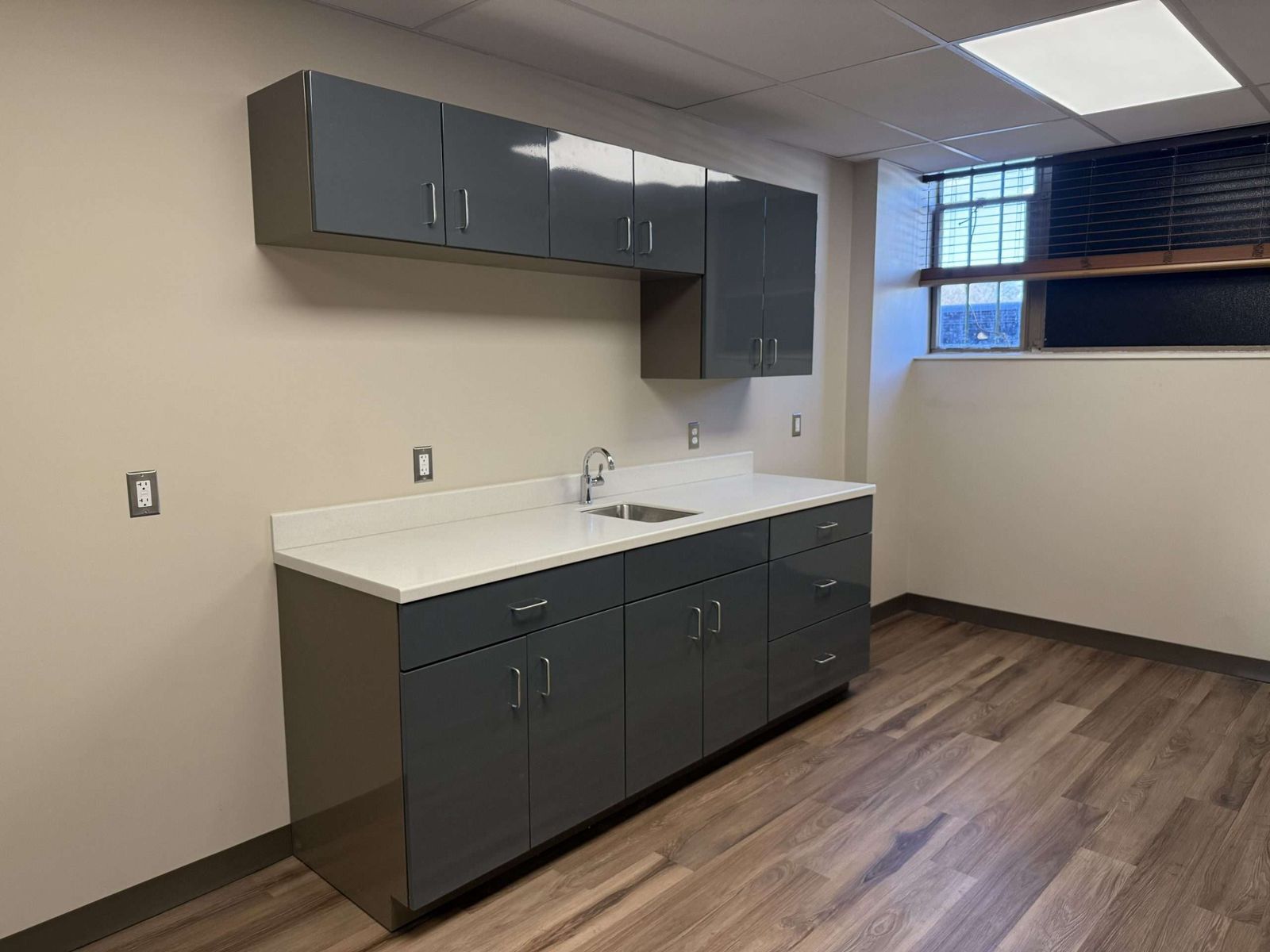 Powder coated steel wall and base cabinets