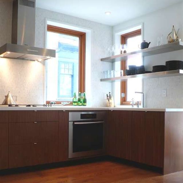 Stainless steel floating shelves by a window, Custom Metal Home