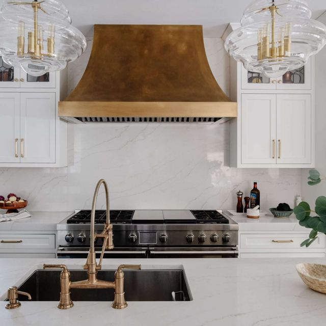 RH-5 brass range hood with a patina finish, kitchen view, by Custom Metal Home
