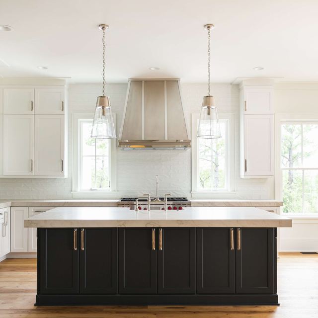 Custom Metal Home range hood. RH-3. Body: stainless steel matte finish. Straps: stainless steel mirror finish