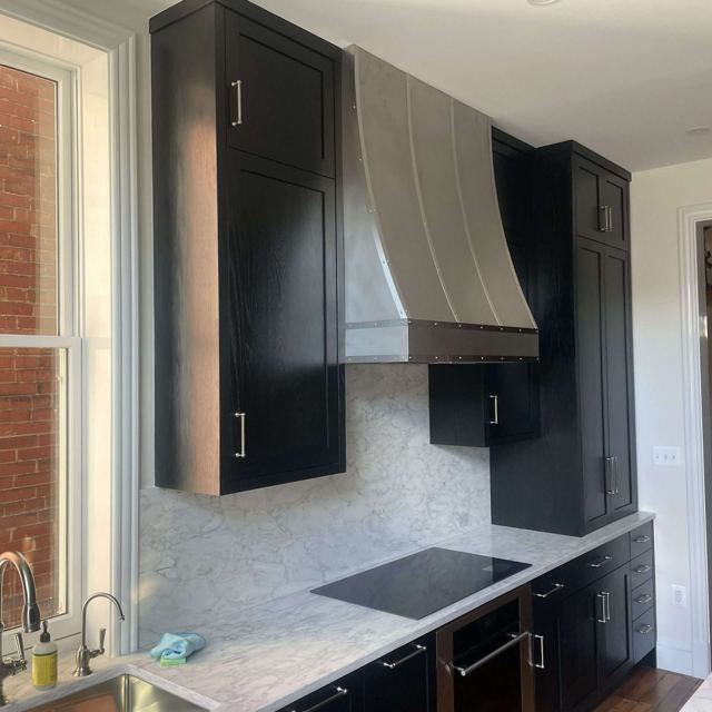 Custom Metal Home range hood. RH-1. Body: Stainless steel matte finish. Straps: stainless steel #4 brushed finish