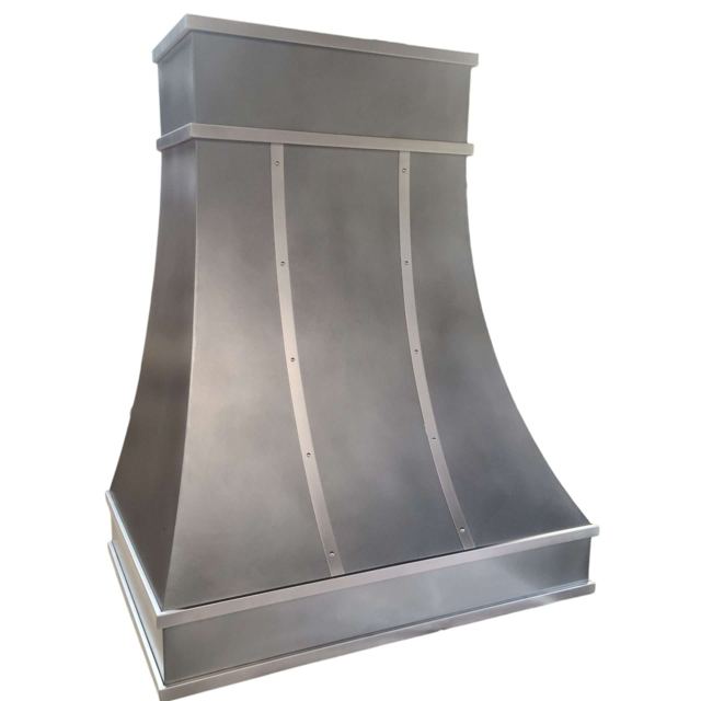 Custom Metal Home range hood. RH-5. Body: Zinc with a light patina finish. Straps: Stainless steel with a matte finish