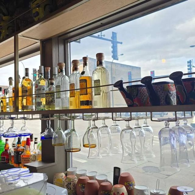 Suspended shelving unit with glassware, Custom Metal Home