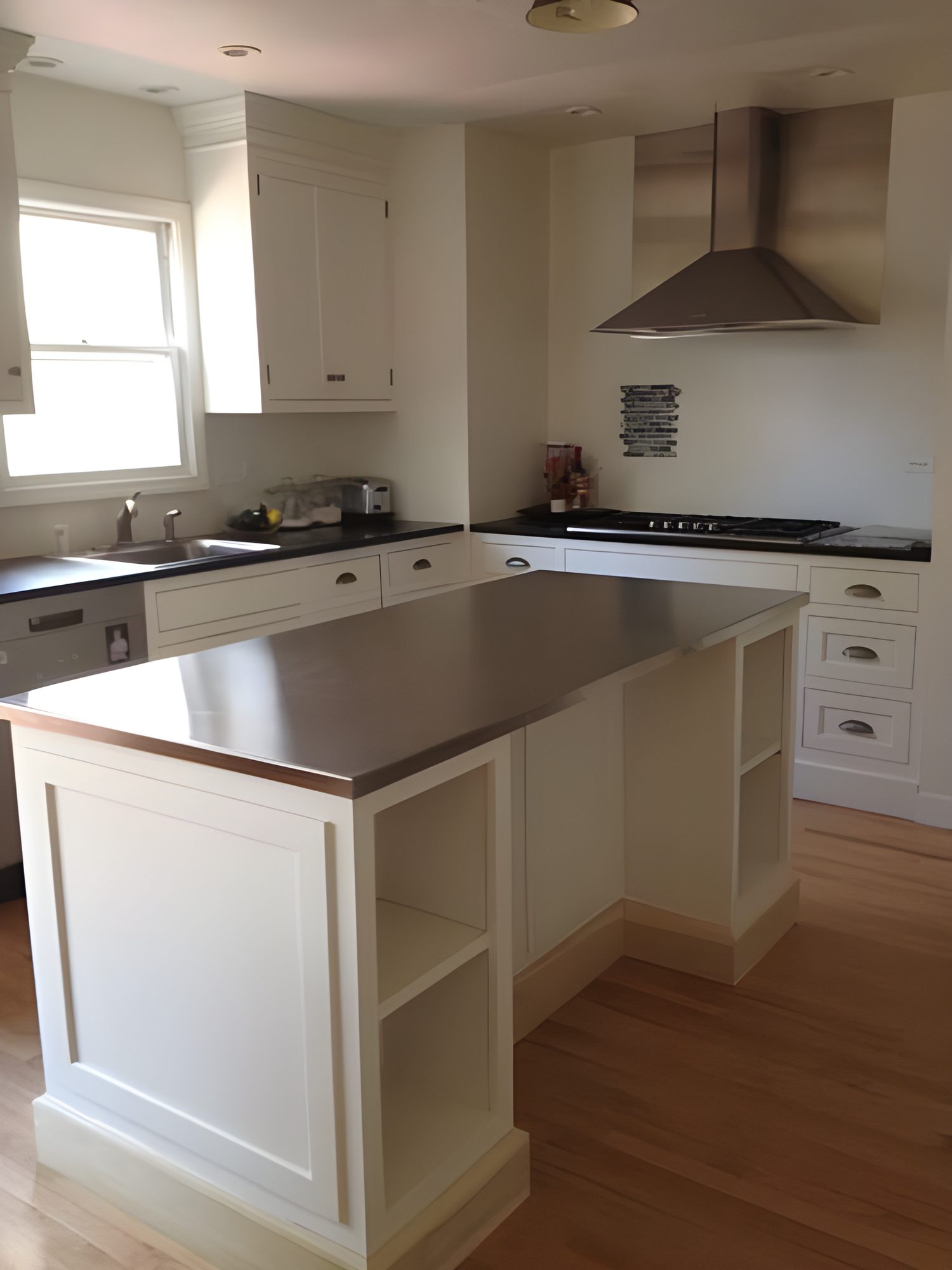 Stainless steel island top with satin finish and profile edge by Custom Metal Home