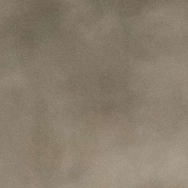 Darkened steel surface sample with hand-applied patina