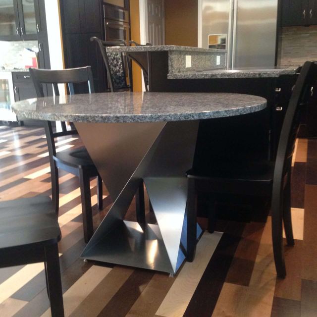 Twist base under a round stone top, Custom Metal Home