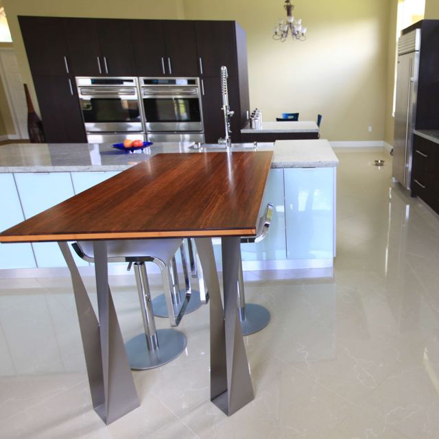 Twist bases supporting a kitchen island overhang, Custom Metal Home